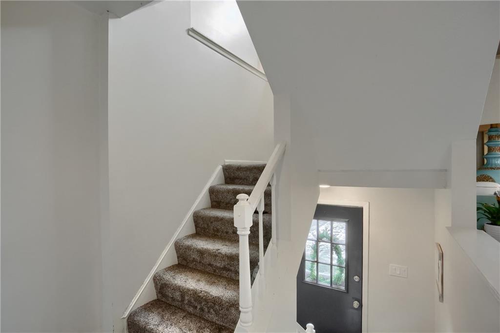582 Broadhead Avenue Pittsburgh, PA 15205 - Photo 4 of 24 a view of entryway with wooden floor and stairs