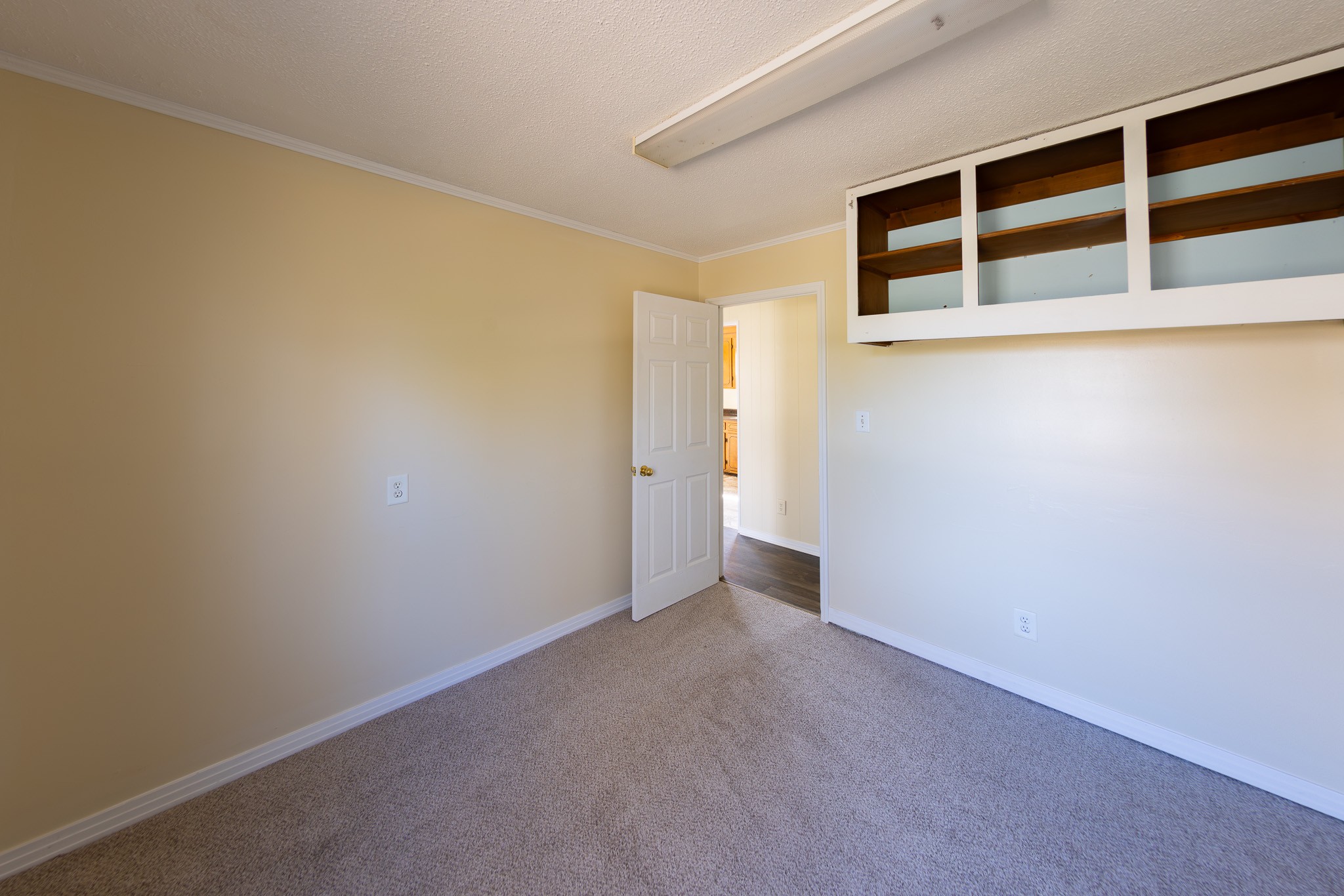 674 Switzerland Road Hohenwald, TN 38462 - Photo 19 of 38 a view of an empty room