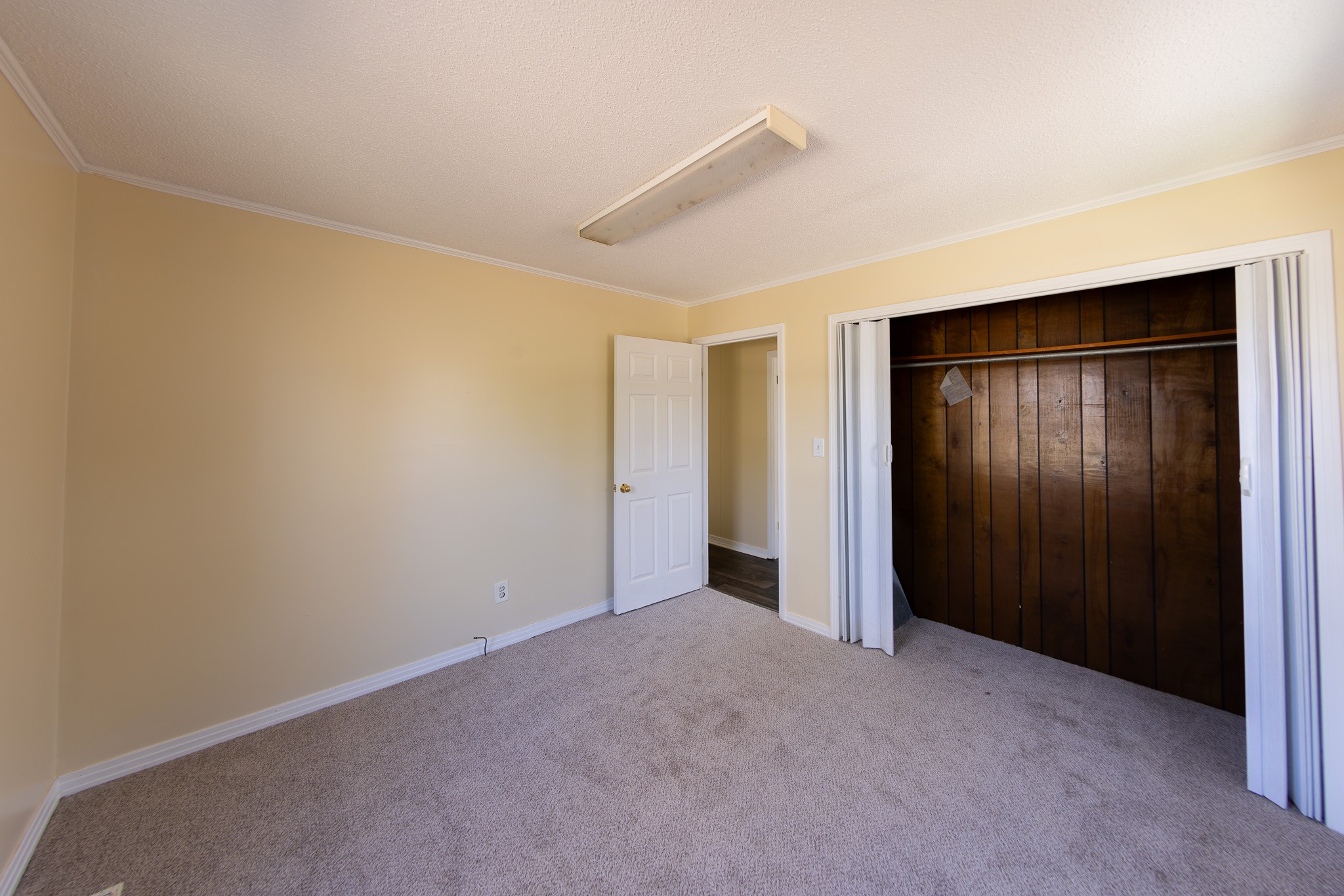 674 Switzerland Road Hohenwald, TN 38462 - Photo 23 of 38 an empty room with closet area