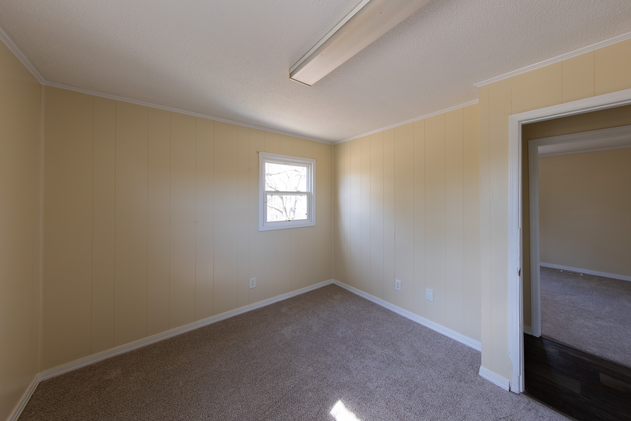 674 Switzerland Road Hohenwald, TN 38462 - Photo 27 of 38 an empty room with windows