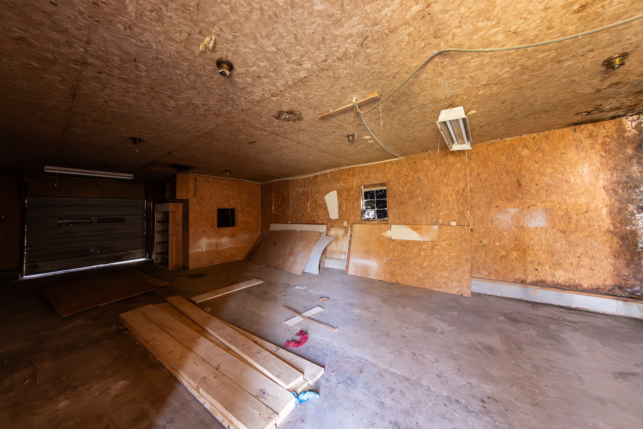 674 Switzerland Road Hohenwald, TN 38462 - Photo 31 of 38 a view of an empty room with a window