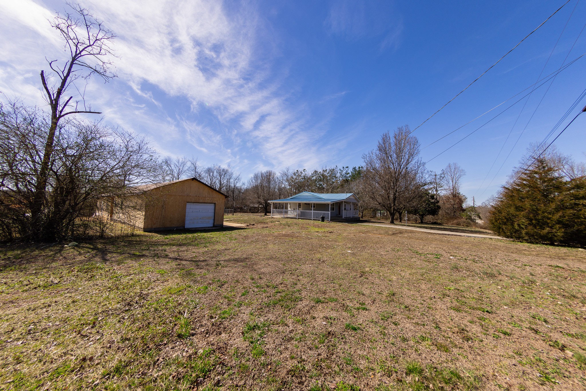 674 Switzerland Road Hohenwald, TN 38462 - Photo 38 of 38 a view of a house with a yard