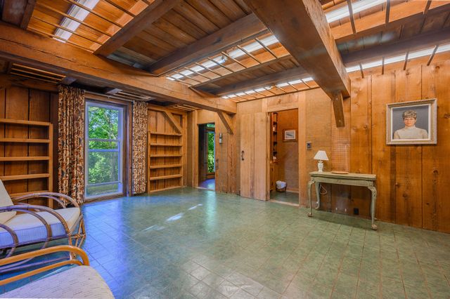 a view of livingroom with furniture and staircase