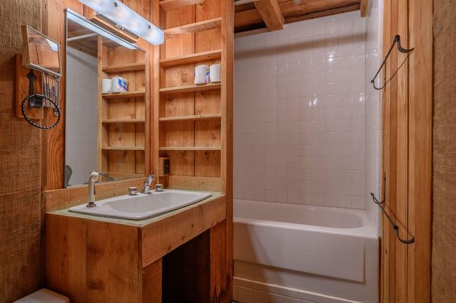 a view of outdoor space with wooden floor and furniture