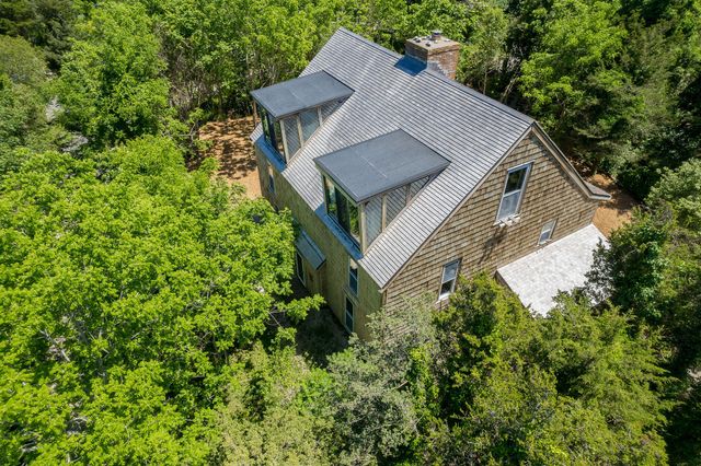 a view of a yard with an outdoor space