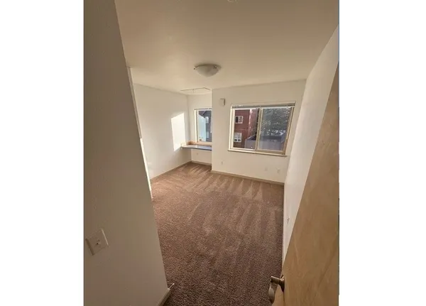 a view of livingroom with hardwood floor and window