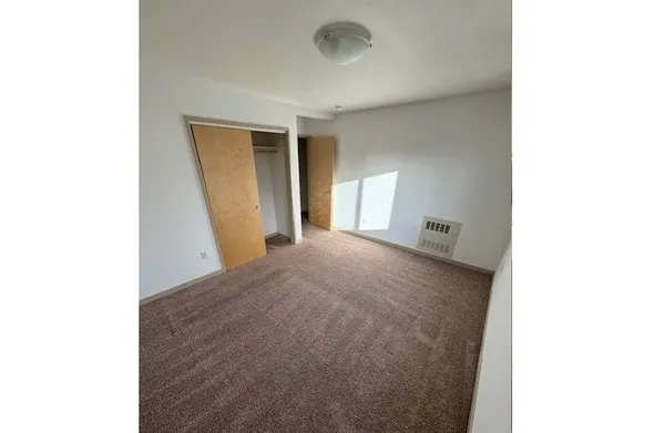 a view of a room with a sink and a window