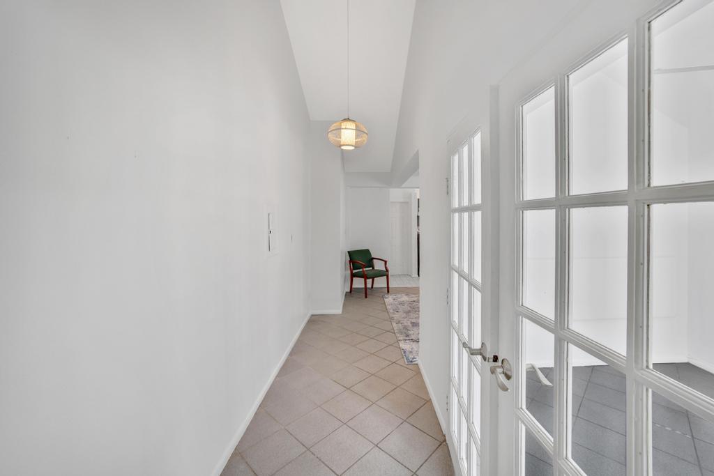 623 Thomas Street, Unit C Key West, FL 33040 - Photo 13 of 25 a view of a hallway with wooden floor and entryway