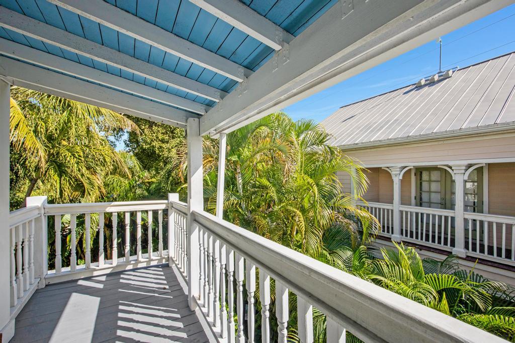 623 Thomas Street, Unit C Key West, FL 33040 - Photo 23 of 25 a view of a wooden deck