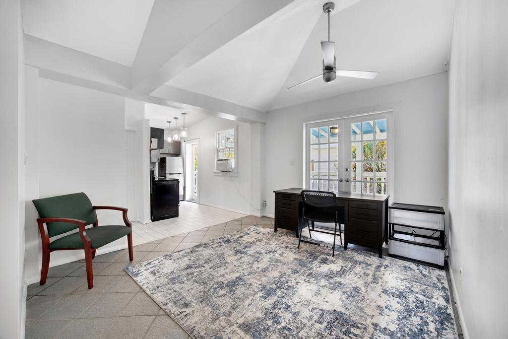 623 Thomas Street, Unit C Key West, FL 33040 - Photo 3 of 25 a living room with furniture and a wooden floor