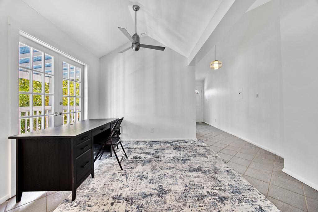 623 Thomas Street, Unit C Key West, FL 33040 - Photo 6 of 25 a view of a workspace with furniture and a window