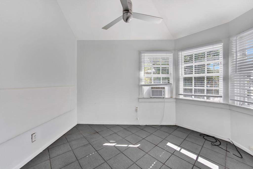 623 Thomas Street, Unit C Key West, FL 33040 - Photo 10 of 25 an empty room with windows