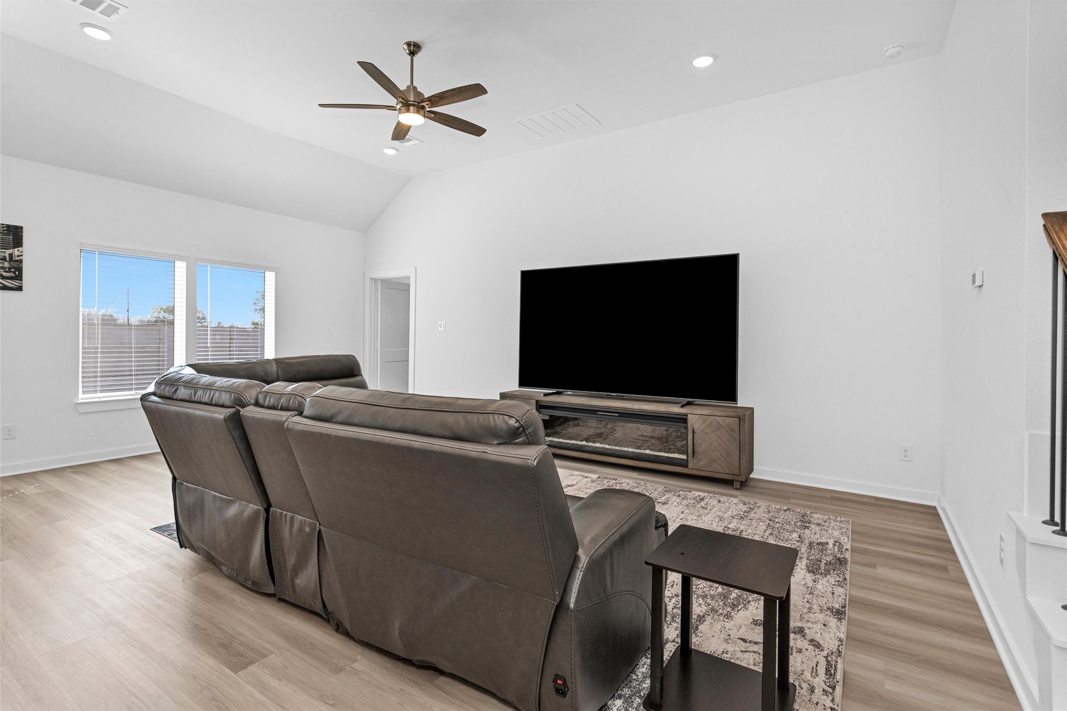 2127 Heather Rdg Way Rosenberg, TX 77471 - Photo 18 of 41 a living room with furniture and a flat screen tv