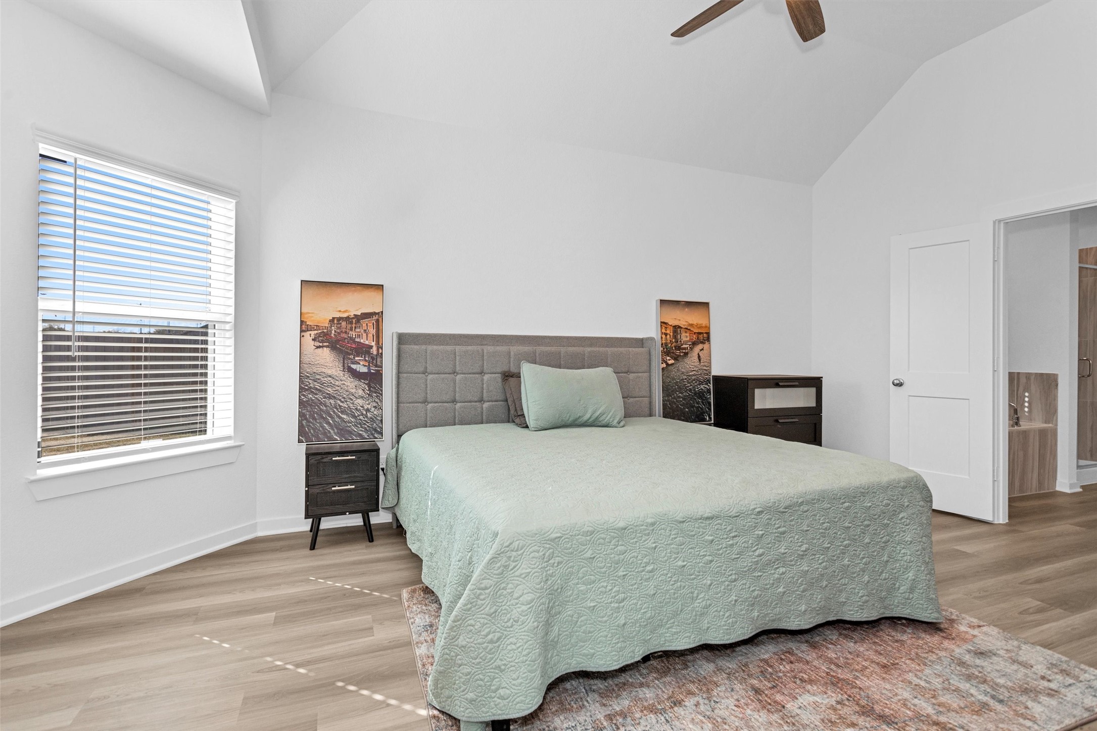 2127 Heather Rdg Way Rosenberg, TX 77471 - Photo 19 of 41 a bedroom with a bed a window and dresser