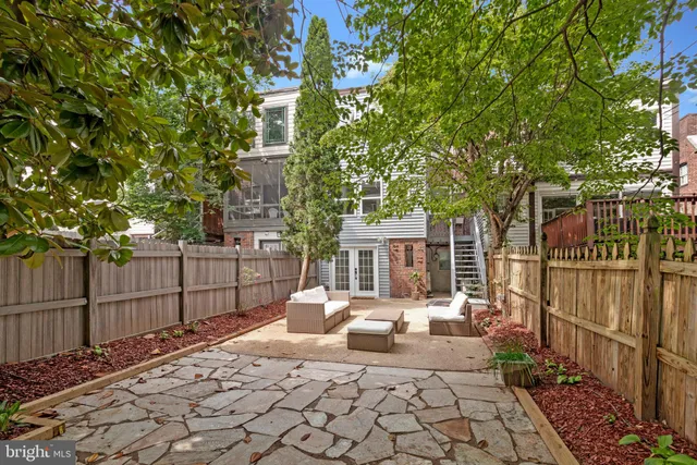 a view of a dinning table and chair in the patio