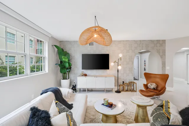 a living room with furniture and window