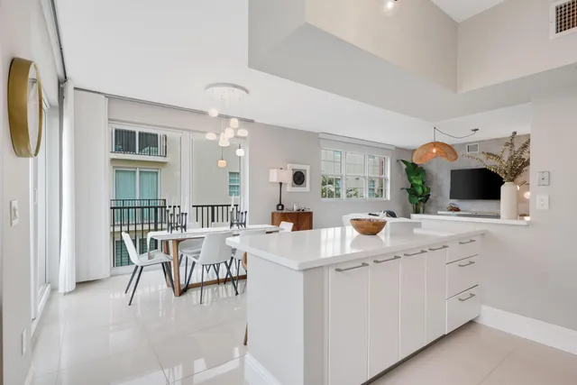 a view of a balcony with furniture