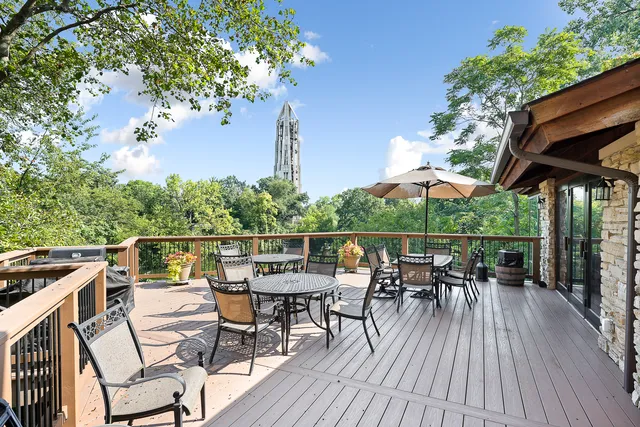 an outdoor space with furniture and umbrella