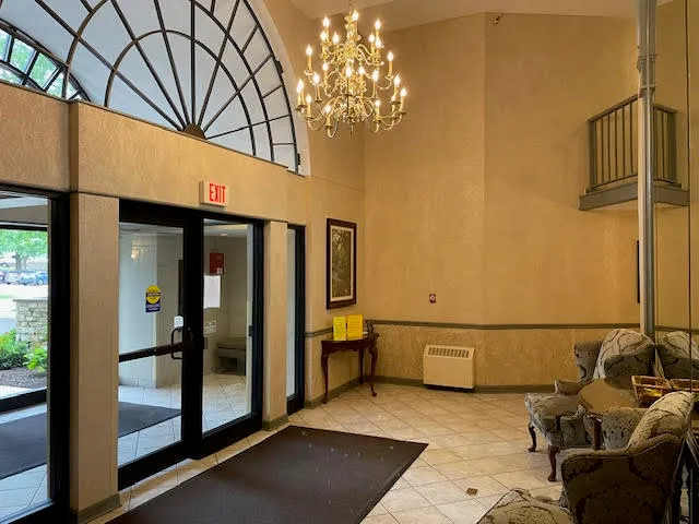 a view of a entryway door with furniture