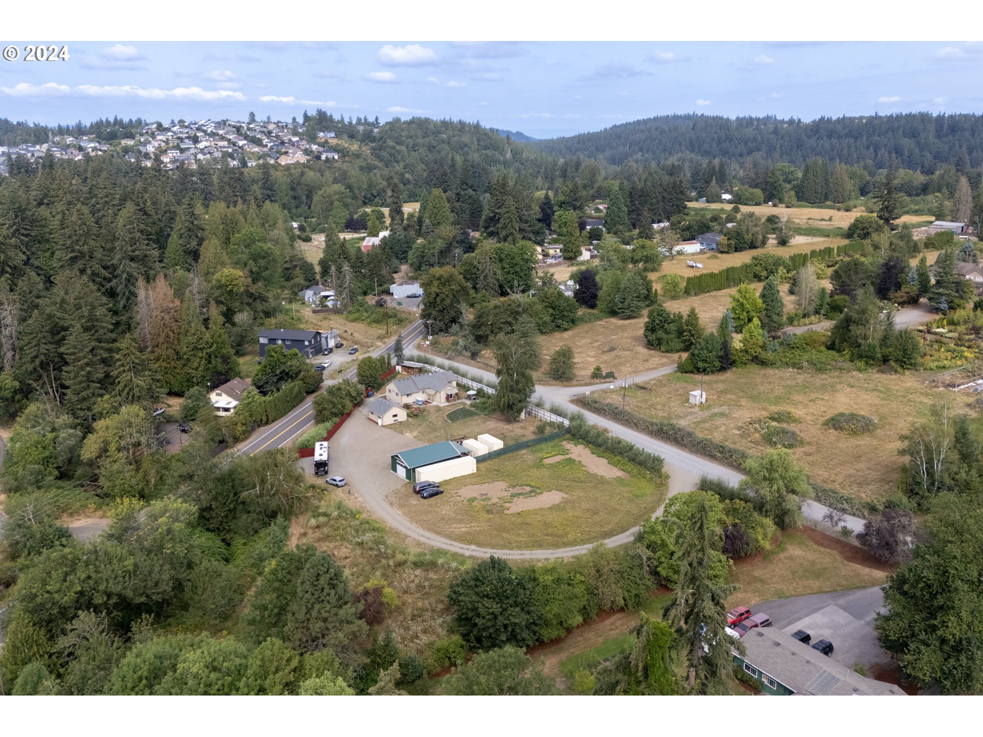 16985 Southeast Foster Road Gresham, OR 97080 - Photo 23 of 48 an aerial view of residential house with outdoor space and mountain view