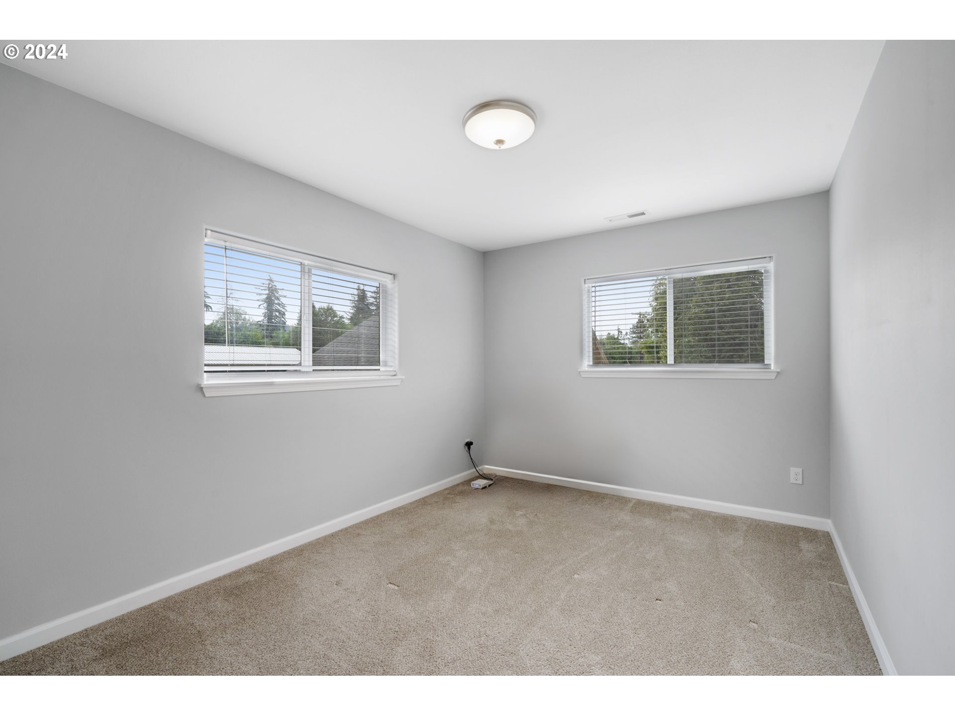 16985 Southeast Foster Road Gresham, OR 97080 - Photo 39 of 48 a view of an empty room with a window