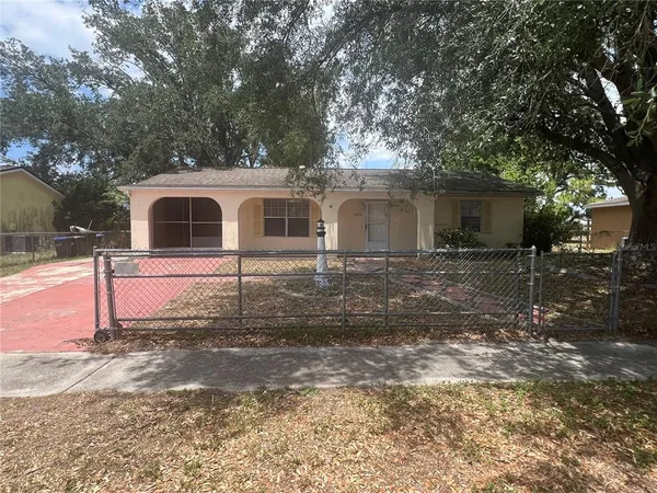 a front view of a house with yard