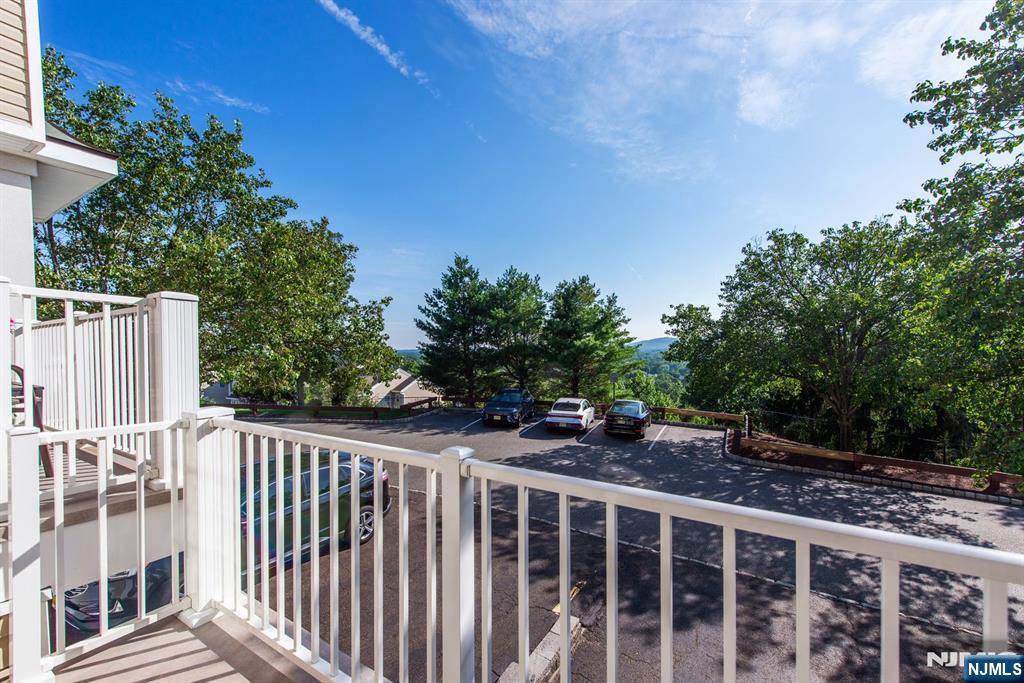146 Summit Ridge, Unit 1406 Pompton Lakes, NJ 07442 - Photo 10 of 26 a view of a wooden fence