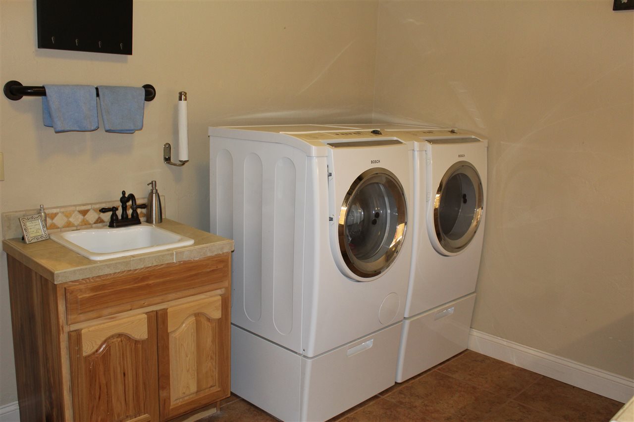 823 Mease Road Grand Junction, CO 81505 - Photo 19 of 26 a utility room with dryer and washer
