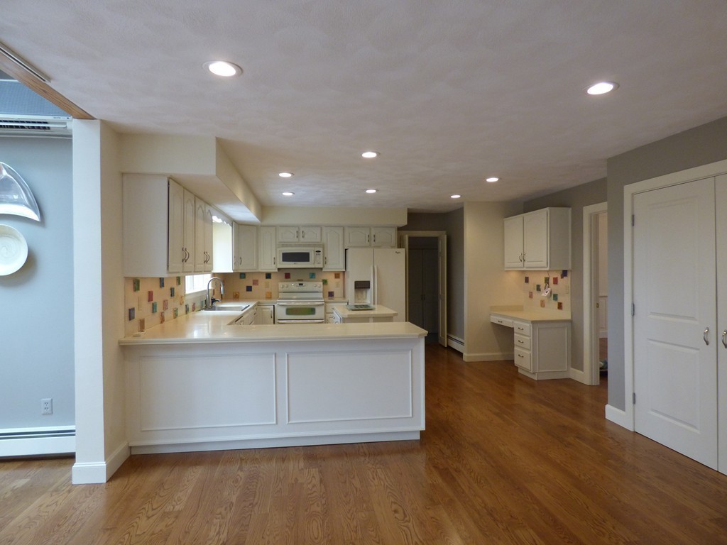 171 West Bare Hill Road Harvard, MA 01451 - Photo 15 of 30 a view of kitchen with wooden floor and stainless steel appliances