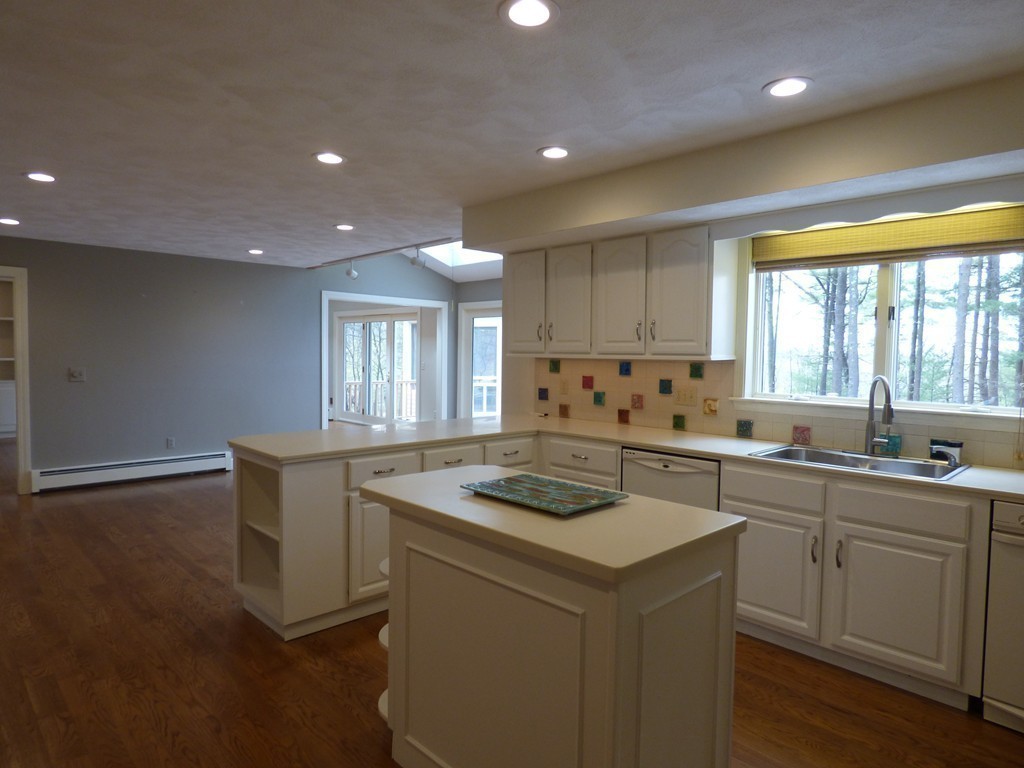 171 West Bare Hill Road Harvard, MA 01451 - Photo 17 of 30 a kitchen that has a sink and a stove in it