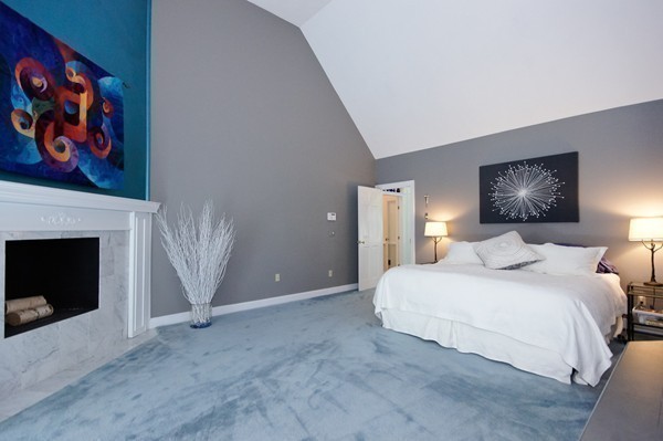 171 West Bare Hill Road Harvard, MA 01451 - Photo 20 of 30 a bedroom with a bed and a fireplace