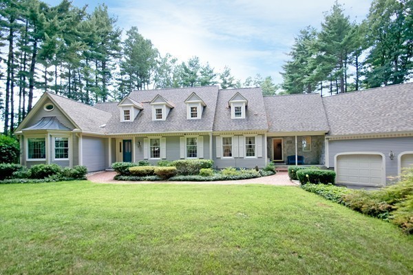 171 West Bare Hill Road Harvard, MA 01451 - Photo 2 of 30 a front view of a house with a yard and plants