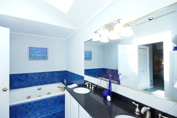 171 West Bare Hill Road Harvard, MA 01451 - Photo 21 of 30 a bathroom with a tub sink and a mirror