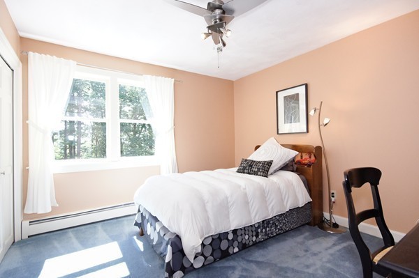 171 West Bare Hill Road Harvard, MA 01451 - Photo 24 of 30 a bedroom with a bed a window and walk in closet