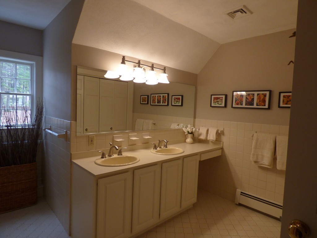 171 West Bare Hill Road Harvard, MA 01451 - Photo 25 of 30 a bathroom with a sink and a mirror