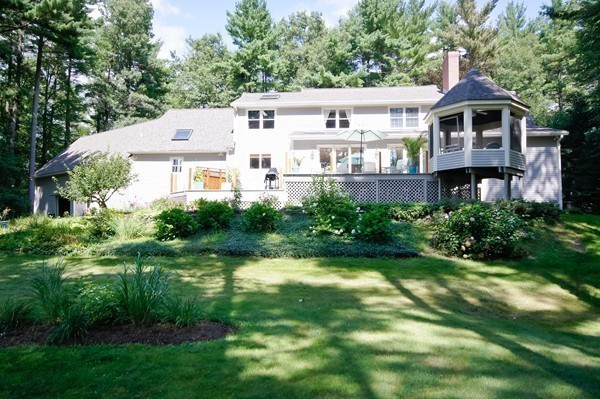 171 West Bare Hill Road Harvard, MA 01451 - Photo 3 of 30 a view of a house with a big yard plants and large trees