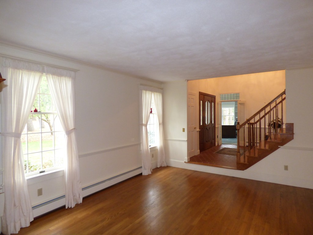 171 West Bare Hill Road Harvard, MA 01451 - Photo 8 of 30 a view of an empty room with wooden floor and a window