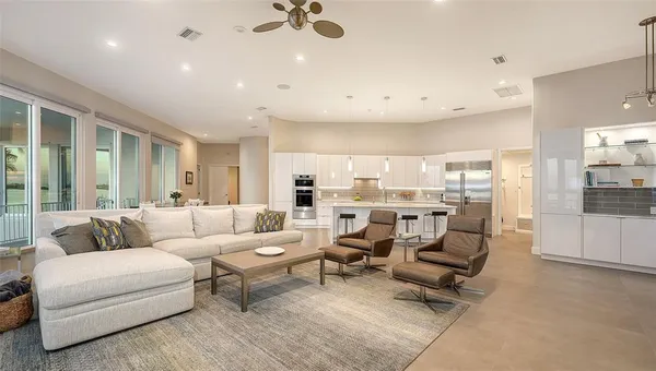 a living room with furniture and a table