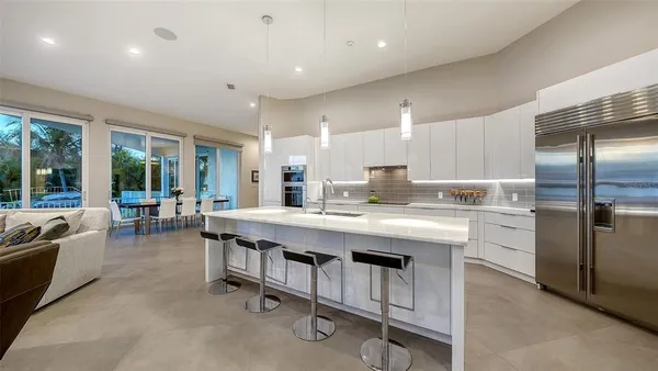 a kitchen with counter top space cabinets and stainless steel appliances