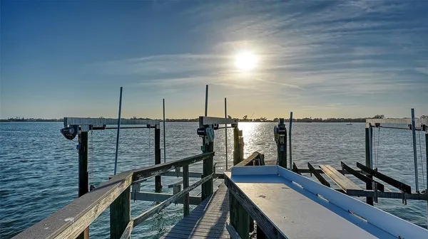 a view of balcony with furniture