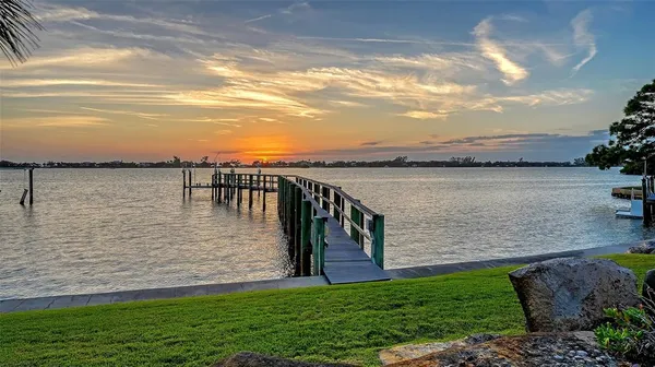 a view of a lake with a garden