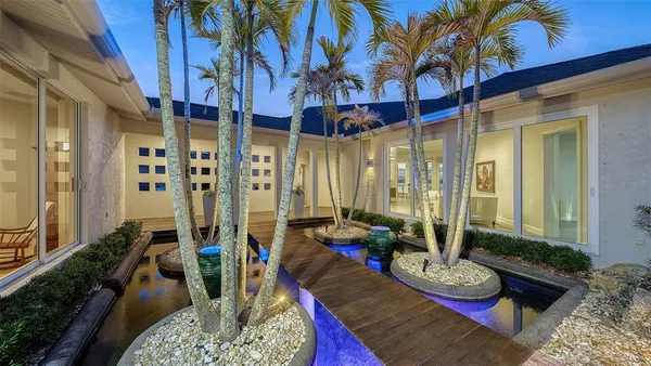 a outdoor living space with furniture and a potted plant