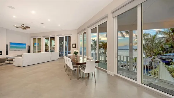 a living room with furniture and a table
