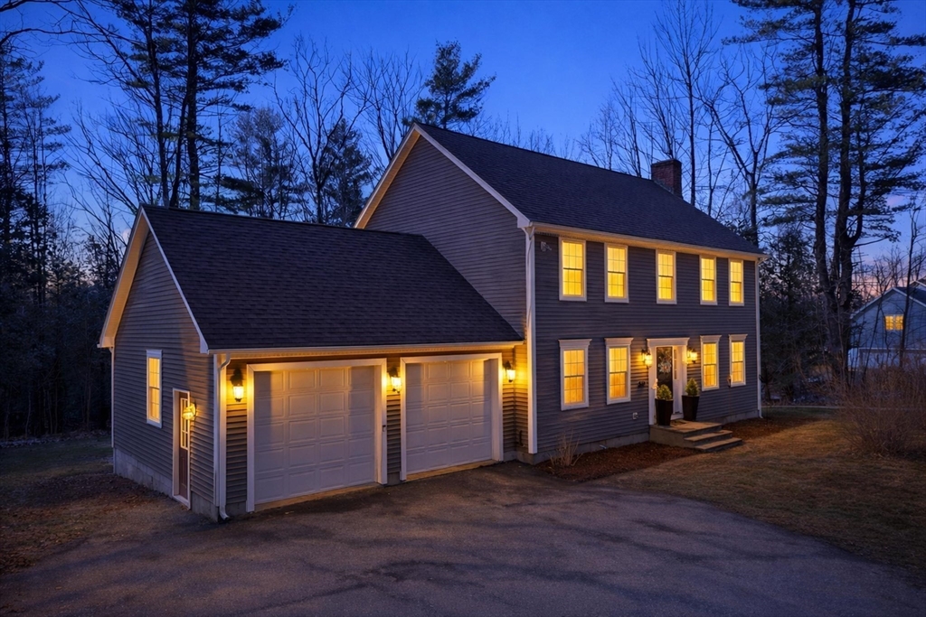 331 East County Road Rutland, MA 01543 - Photo 36 of 37 a view of house with a yard
