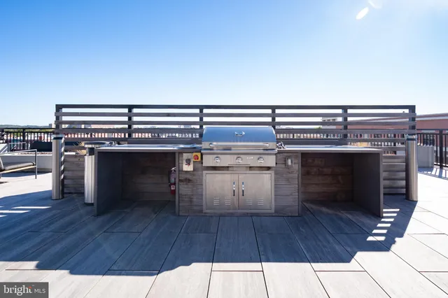 a view of a chairs and bench in the balcony