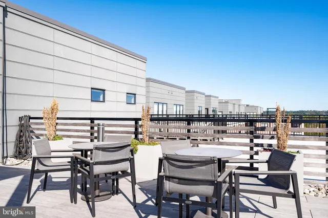 a view of a terrace with seating area