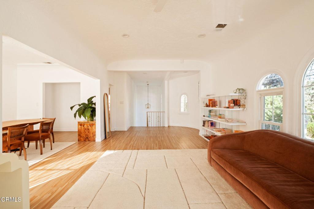 5166 Packard Street Los Angeles, CA 90019 - Photo 4 of 31 a spacious bedroom with a bed and a table in it