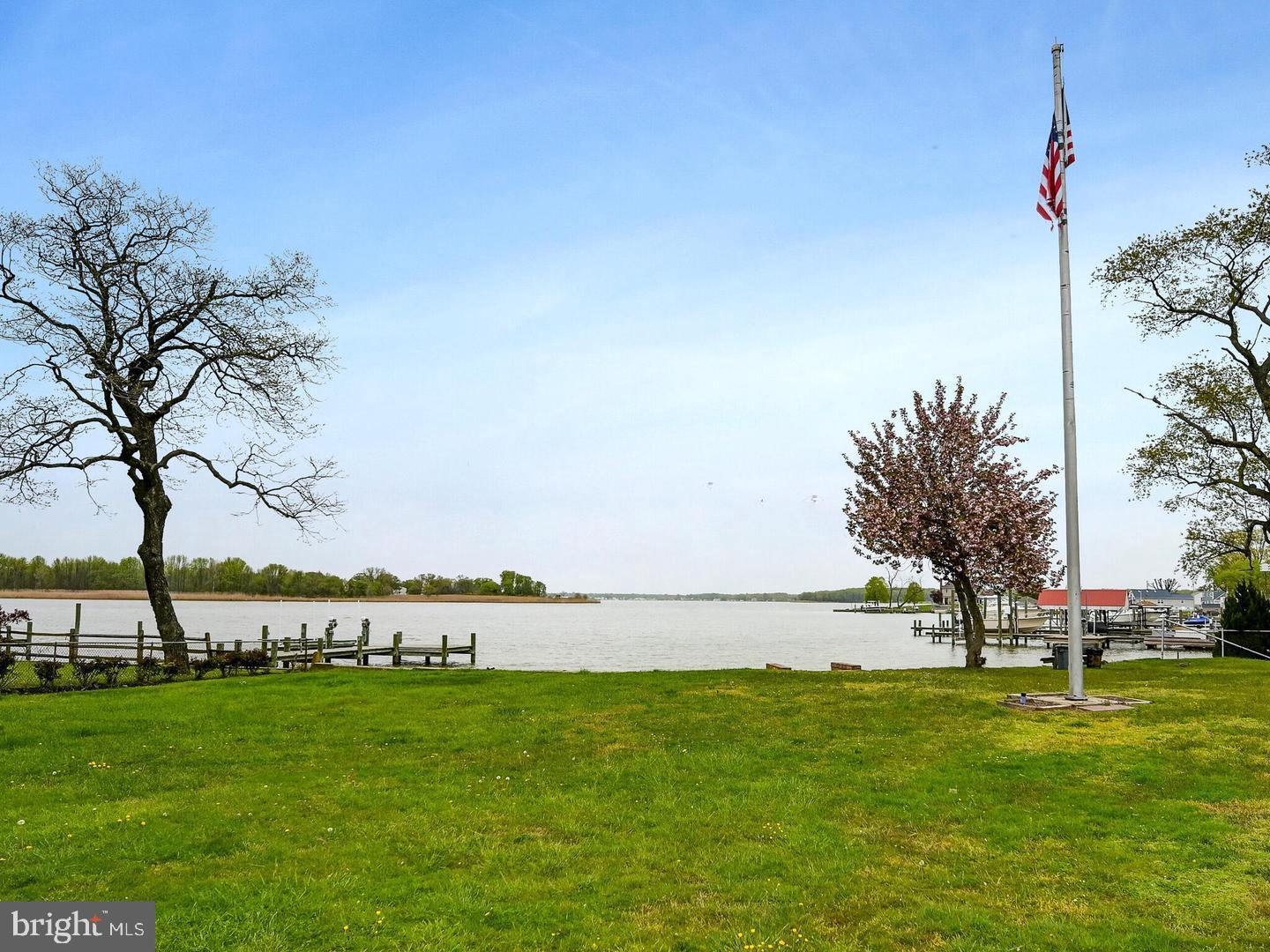 3206 Lynch Road Baltimore, MD 21219 - Photo 48 of 70 a view of an ocean with a big yard and large trees
