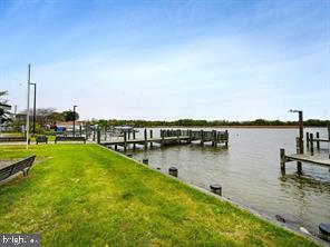 3206 Lynch Road Baltimore, MD 21219 - Photo 51 of 70 a view of a lake with houses in the back
