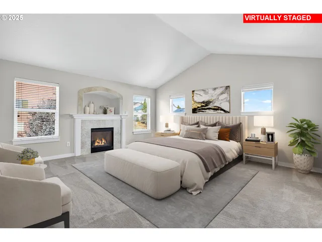 a bedroom with a bed and a fireplace